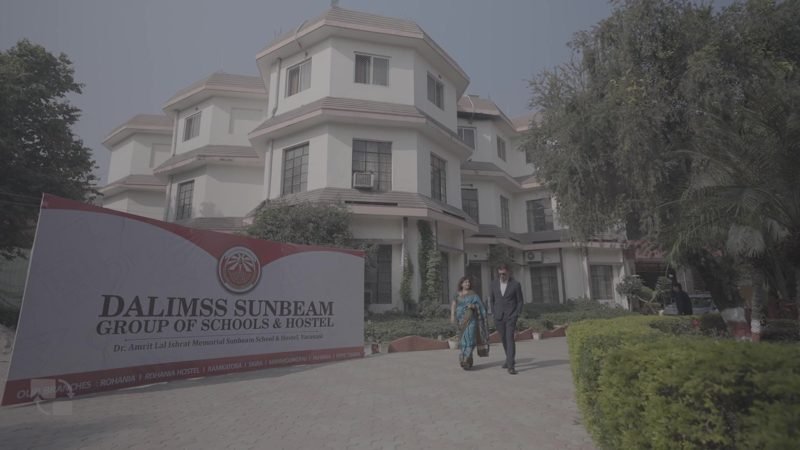 Dalimss Sunbeam school entrance sign in front of the main building