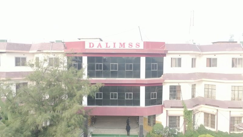 Aerial view of the Dalimss Sunbeam school building at Rohania, with the school name on the front