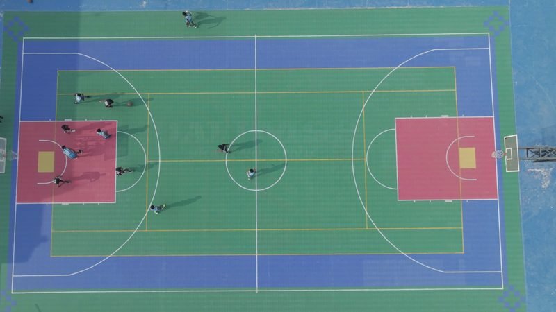 The outdoor basketball court seen from directly above, Rohania