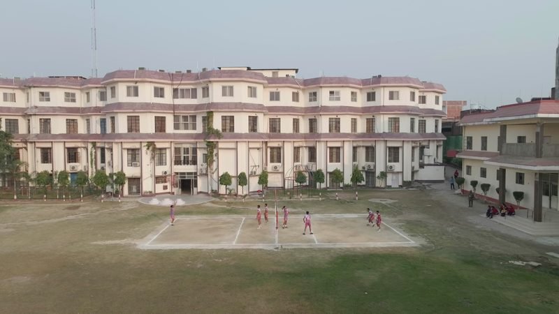 The main building and playing field from the air, Rohania