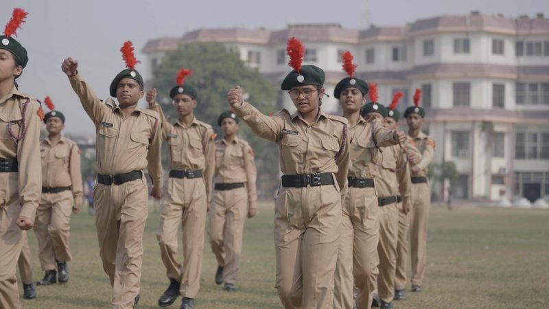 NCC cadets on parade in front of the school buildings, Rohania