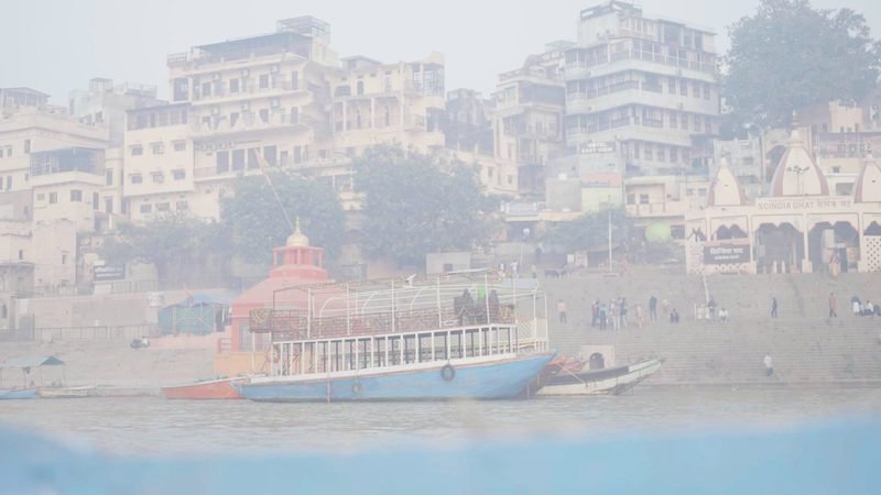 The ghats of Varanasi seen from a boat on the Ganga