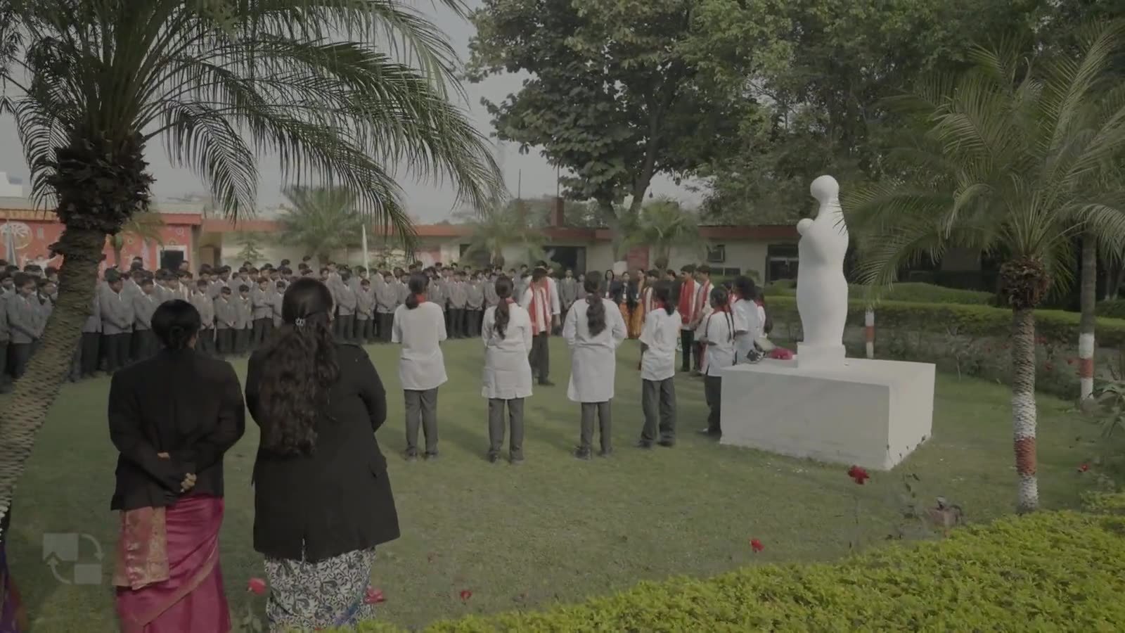 Students at morning assembly on the lawn at Dalimss Sunbeam, Rohania