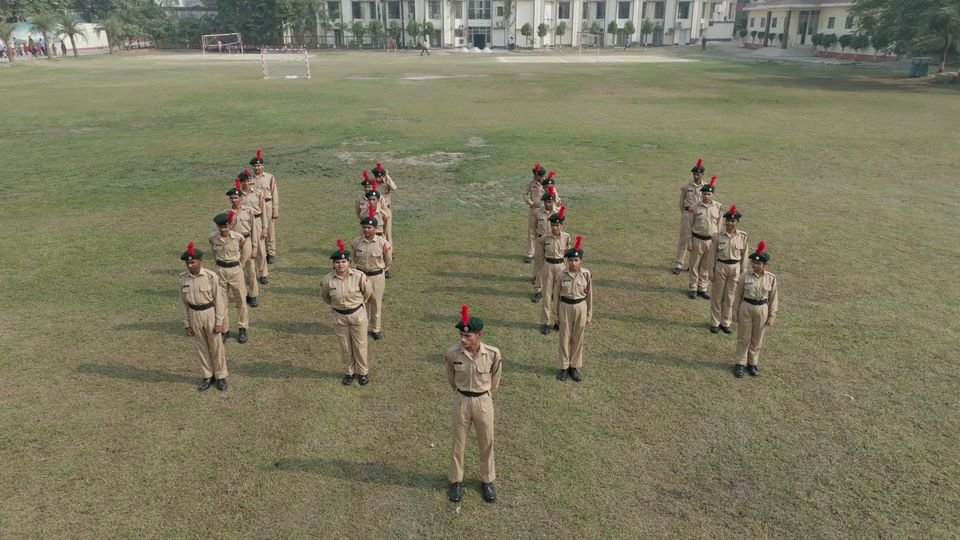 NCC cadets at drill on the playing field at Rohania, seen from a drone