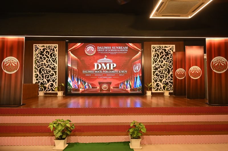 Auditorium stage set for the Dalimss Mock Parliament and MUN 2026 at Dalimss Sunbeam School