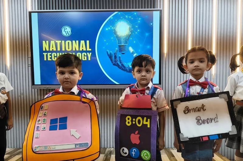 Young learners in handmade technology costumes, Mahmoorganj
