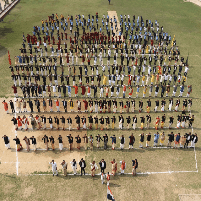 Dalimss Sunbeam staff together on the field, seen from above